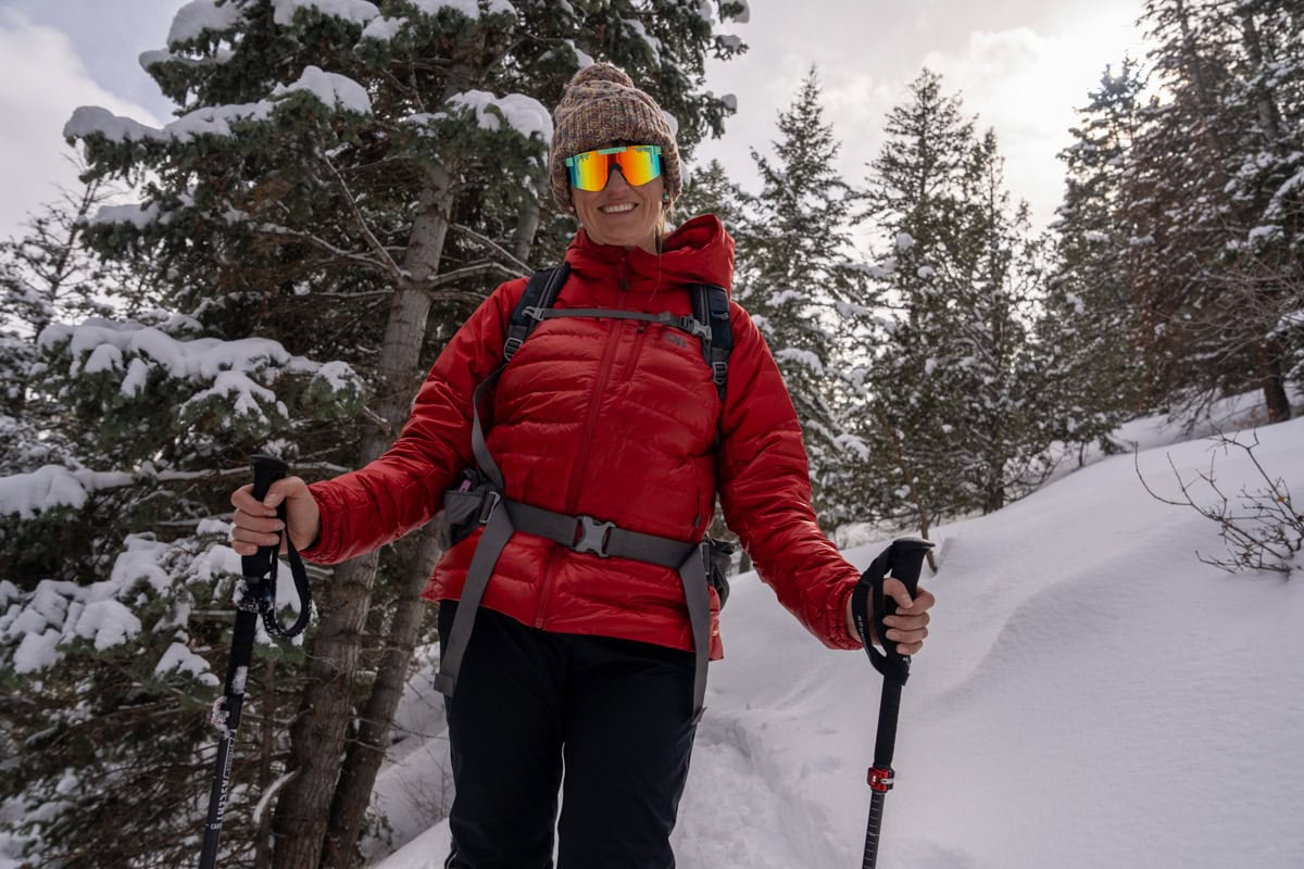 Kristen Bor on a winter hike in her Outdoor Research Helium Down Hoodie